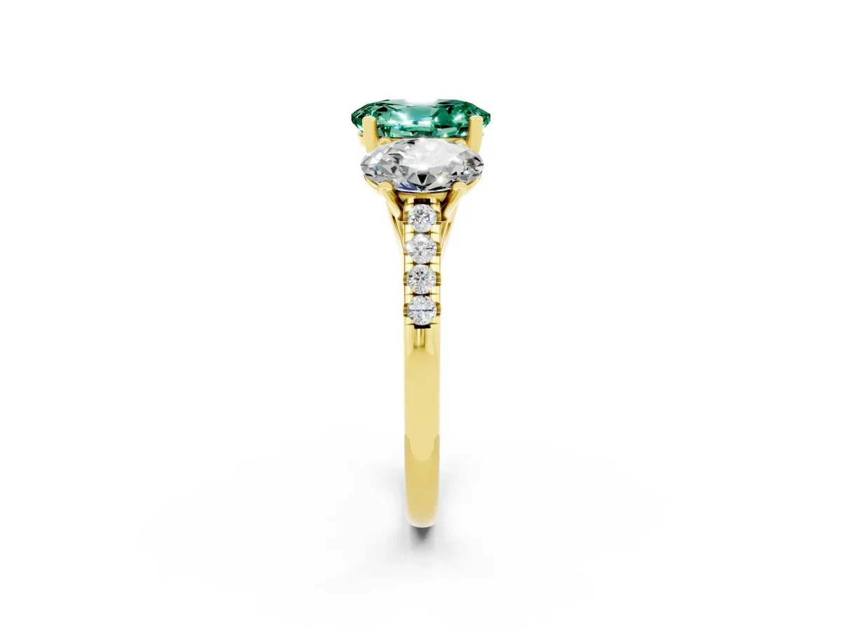 Three-Stone Oval Cut Green Sapphire Ring with Round Pavé Band and Prong Setting Yellow gold