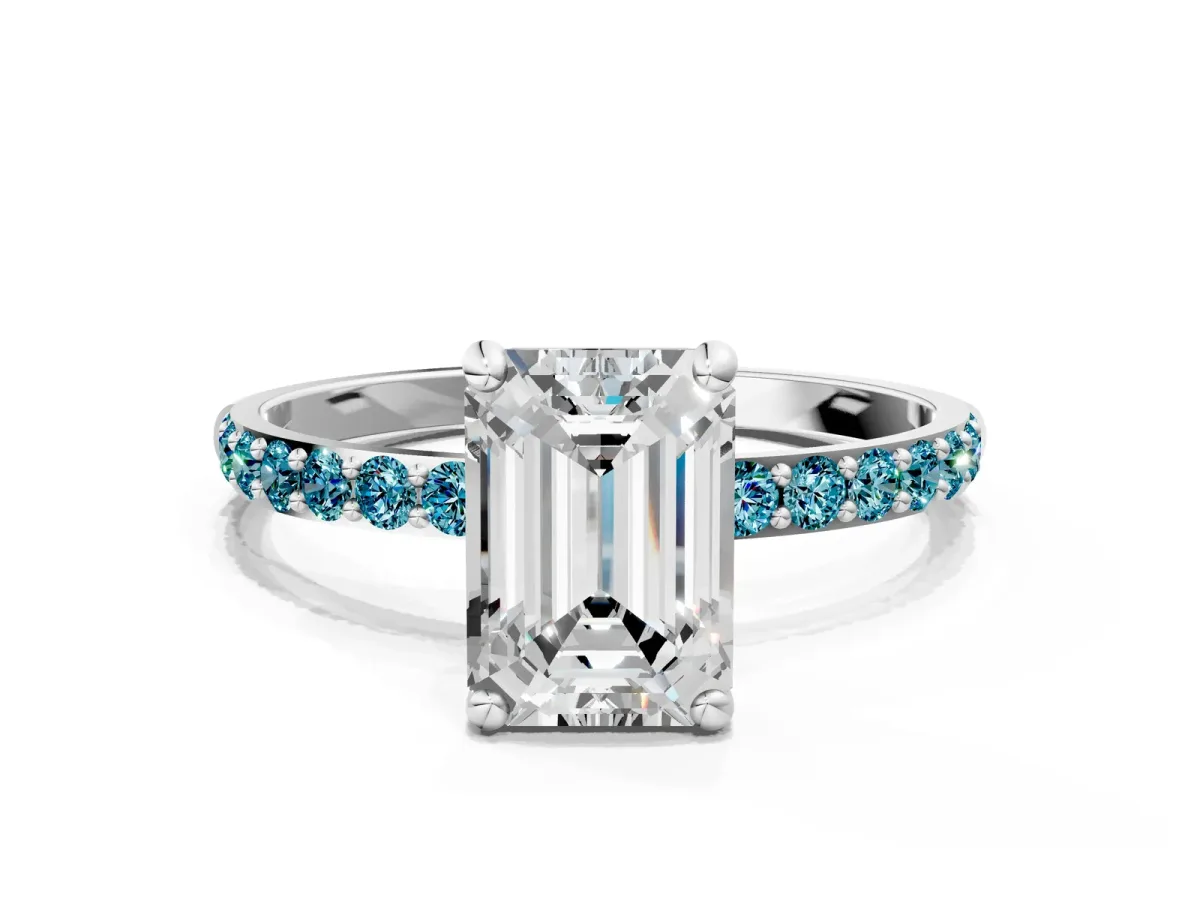 Emerald Cut Diamond Solitaire Ring with Round Blue Topaz Pavé Band and Prong Setting Silver