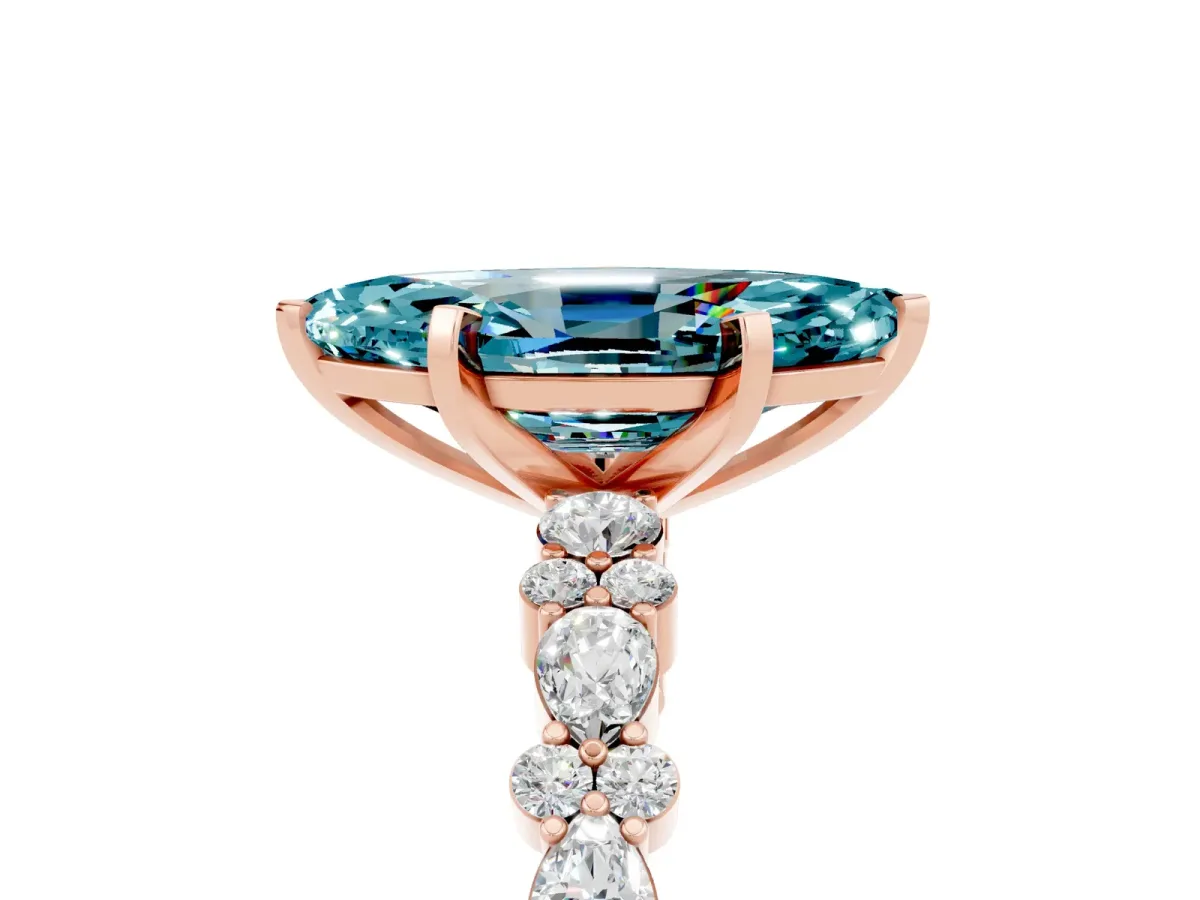 Marquise Cut Blue Topaz Side Stone Solitaire Ring with Round and Four-Prong Setting Rose gold