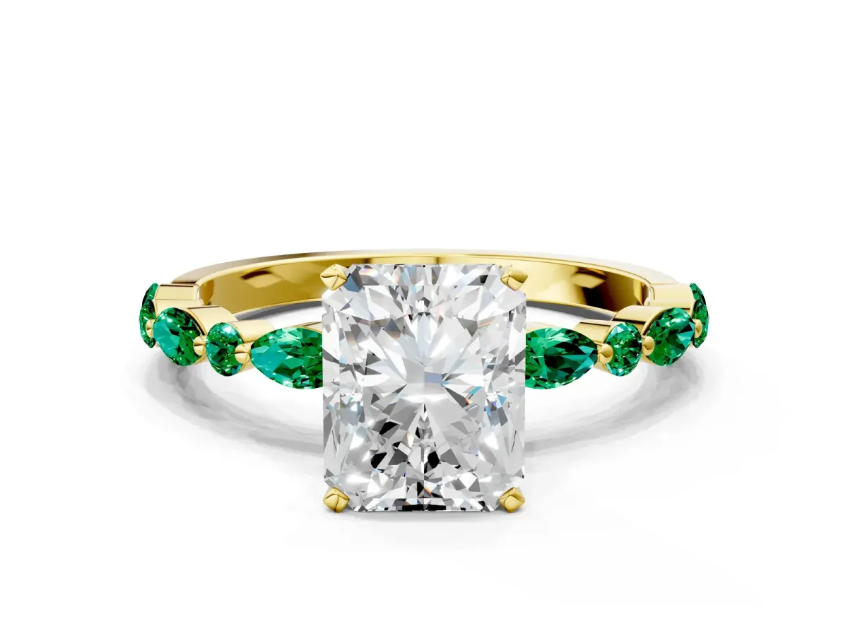Radiant Cut Diamond Ring with Marquise and Round Emerald Side Stones and Four-Prong Setting Yellow gold