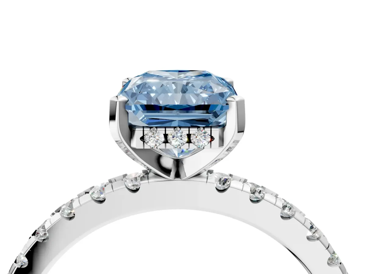 Fancy Blue Radiant Cut Diamond Solitaire Ring with Round Pavé Band and Four-Prong Setting Silver