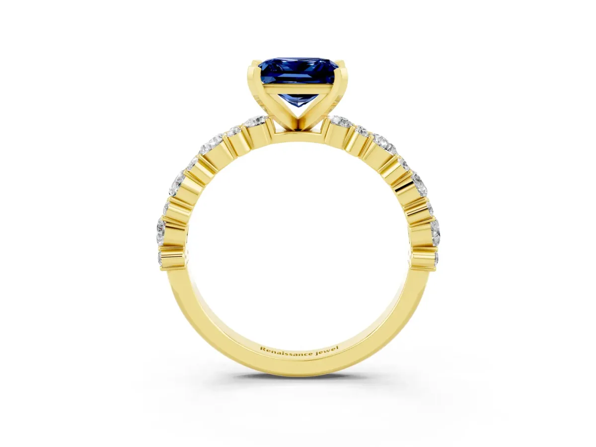 Princess Cut Blue Sapphire Side Stone Solitaire Ring with Round and Four-Prong Setting Yellow gold