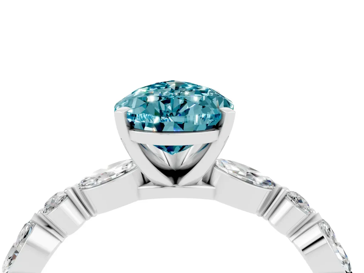 Pear Cut Blue Topaz Ring with Marquise and Round Side Stones and Four-Prong Setting Platinum