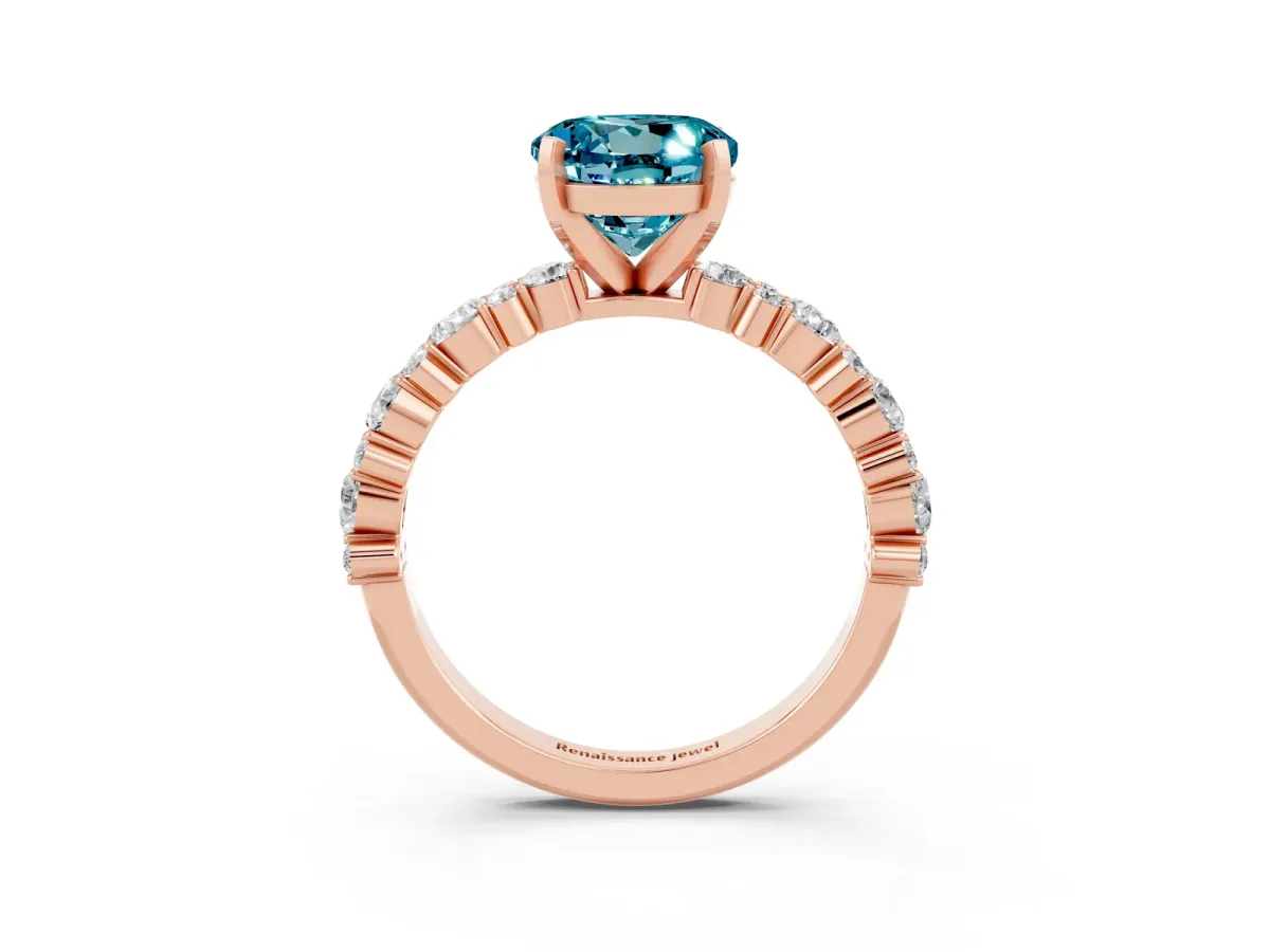 Round Cut Blue Topaz Side Stone Solitaire Ring with Round and Four-Prong Setting Rose gold