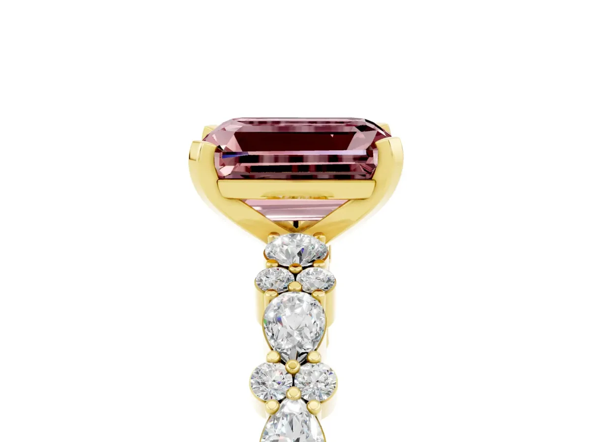 Emerald Cut Morganite Side Stone Solitaire Ring with Round and Four-Prong Setting Yellow gold