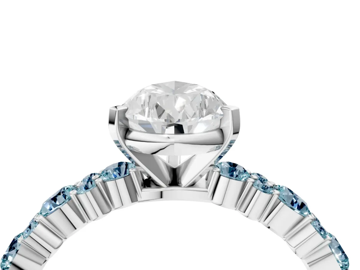 Pear Cut Diamond Side Stone Solitaire Ring with Round Aquamarine and Four-Prong Setting White gold