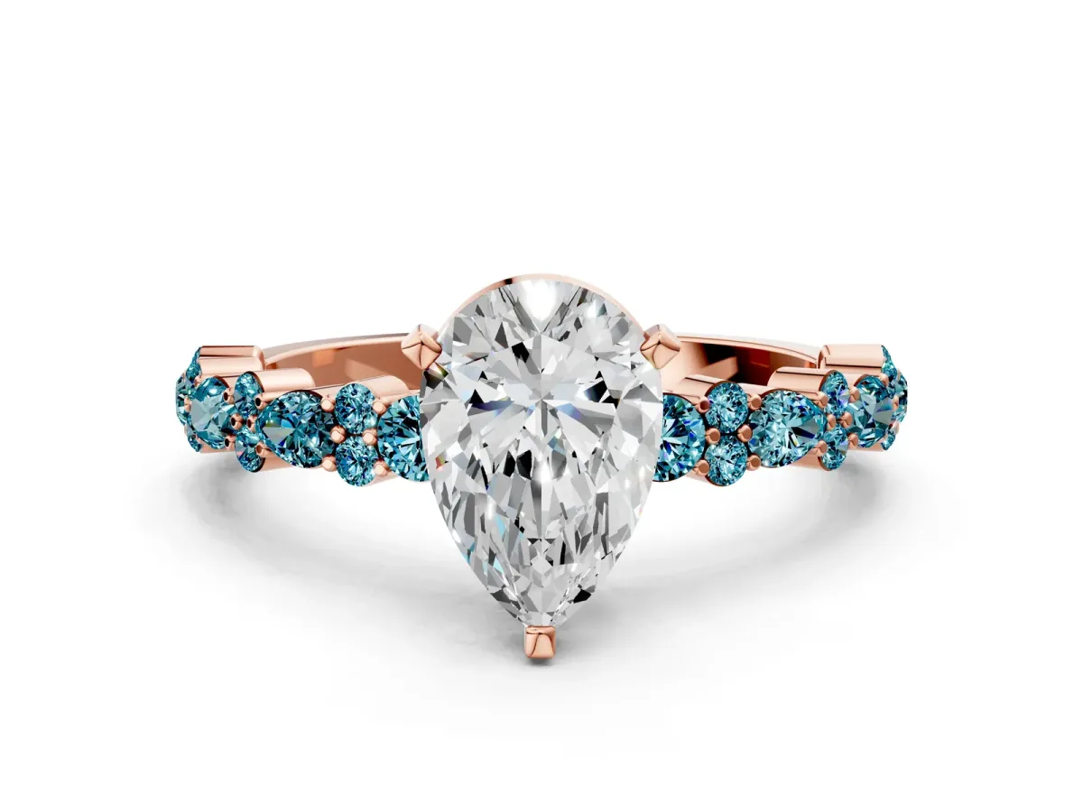 Pear Cut Diamond Side Stone Solitaire Ring with Round Blue Topaz and Four-Prong Setting Rose gold