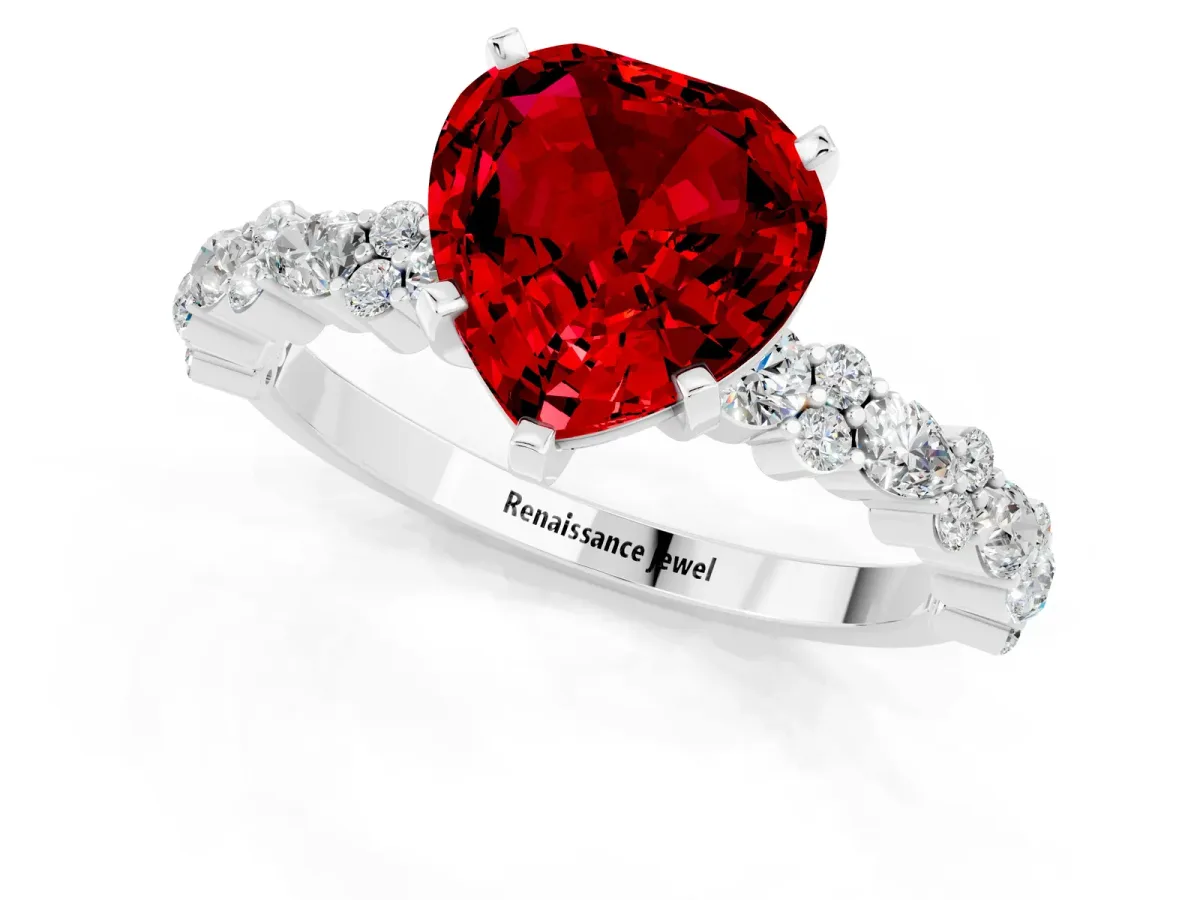 Heart Cut Ruby Side Stone Solitaire Ring with Round and Four-Prong Setting Platinum