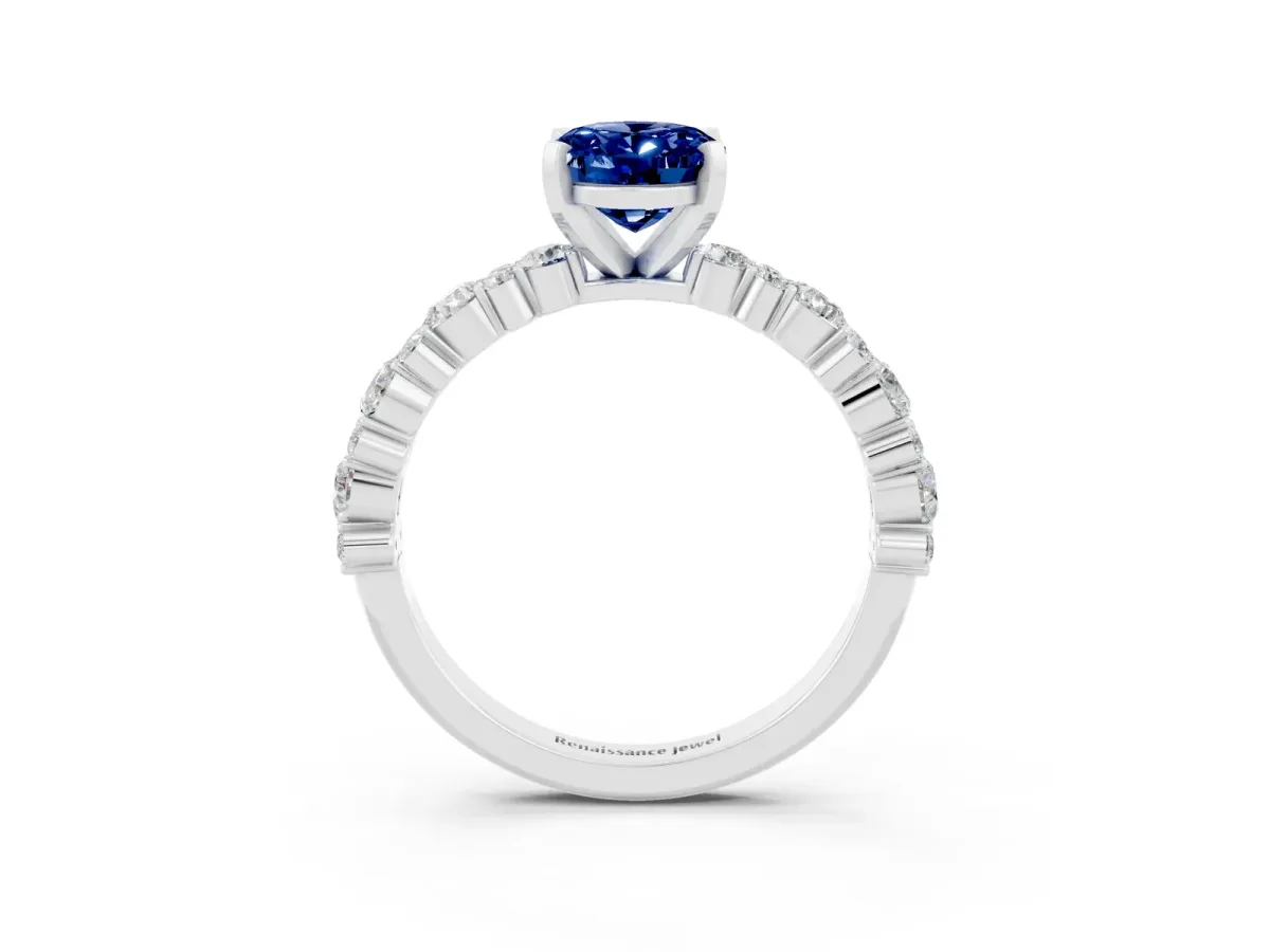 Oval Cut Blue Sapphire Side Stone Solitaire Ring with Round and Four-Prong Setting White gold