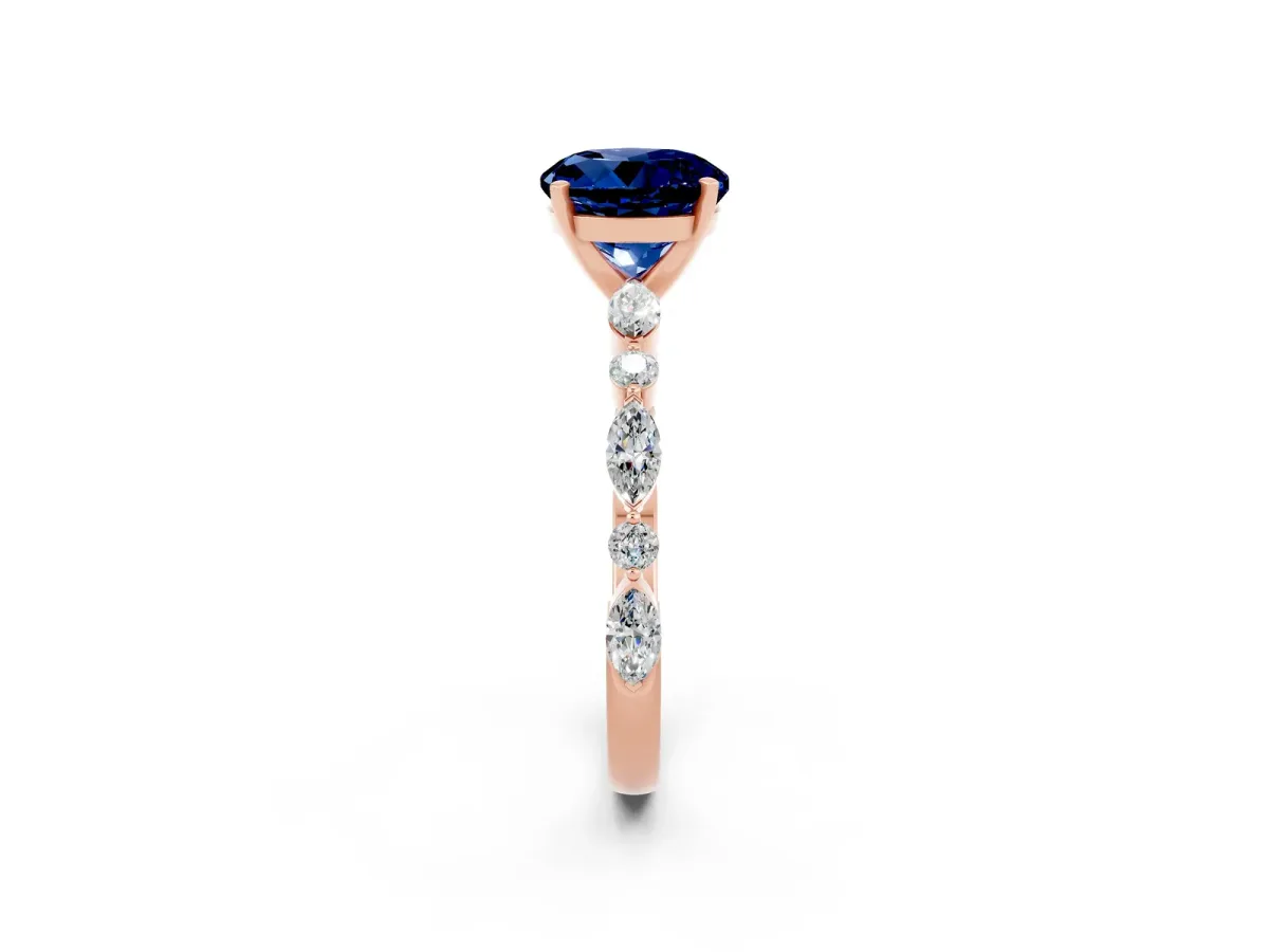 Round Cut Blue Sapphire Ring with Marquise and Round Side Stones and Four-Prong Setting Rose gold