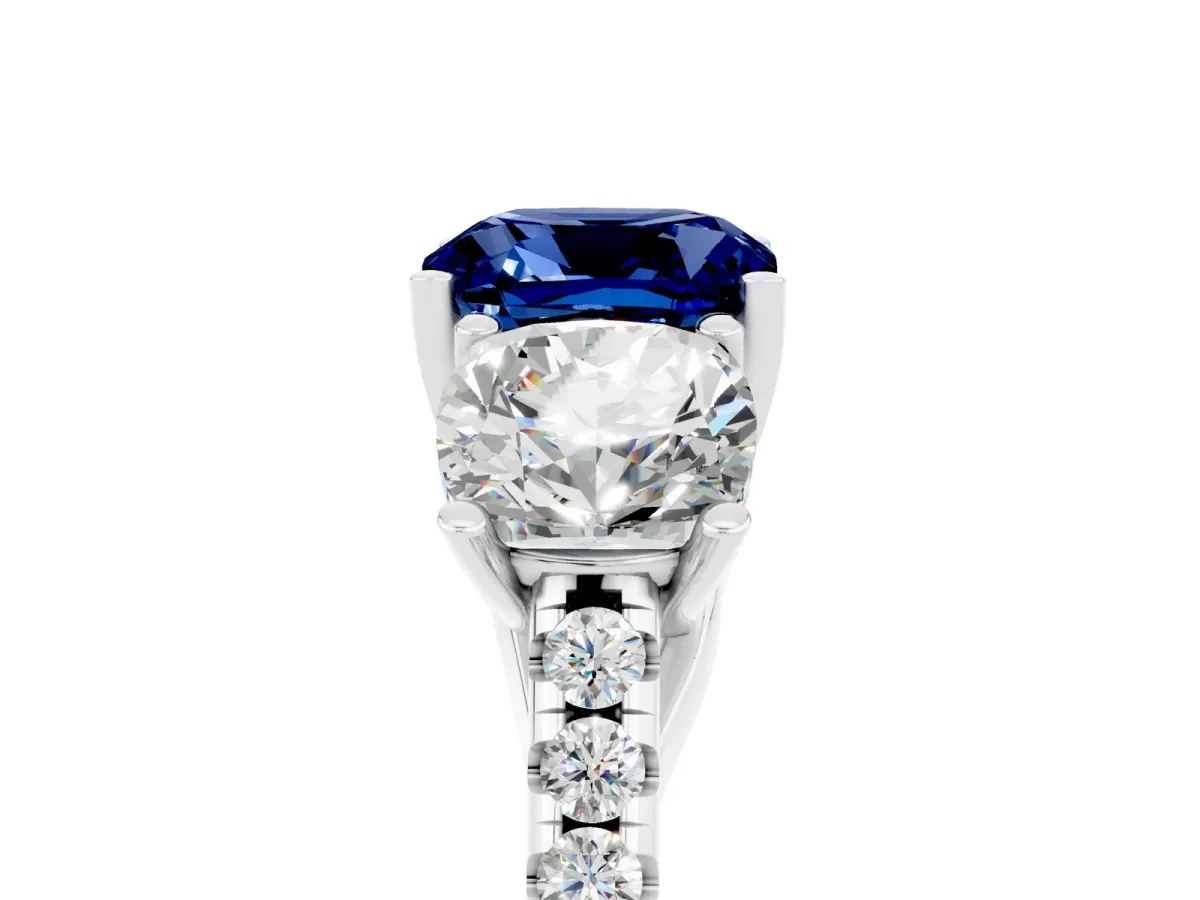 Three-Stone Cushion Cut Blue Sapphire Ring with Round Pavé Band and Prong Setting Silver