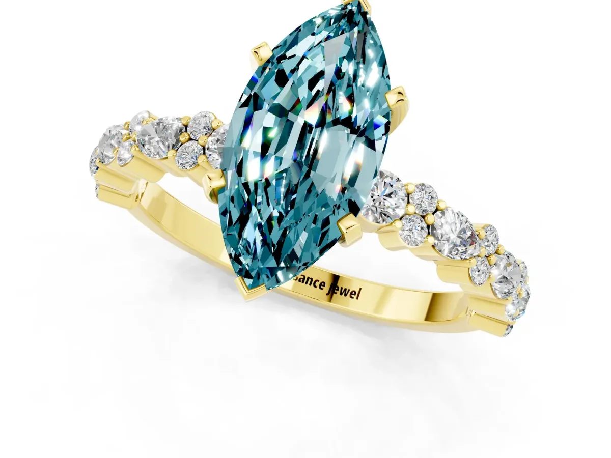 Marquise Cut Blue Topaz Side Stone Solitaire Ring with Round and Four-Prong Setting Yellow gold