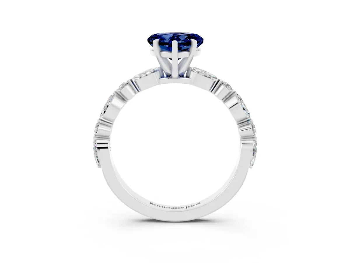 Heart Cut Blue Sapphire Ring with Marquise and Round Side Stones and Four-Prong Setting Silver