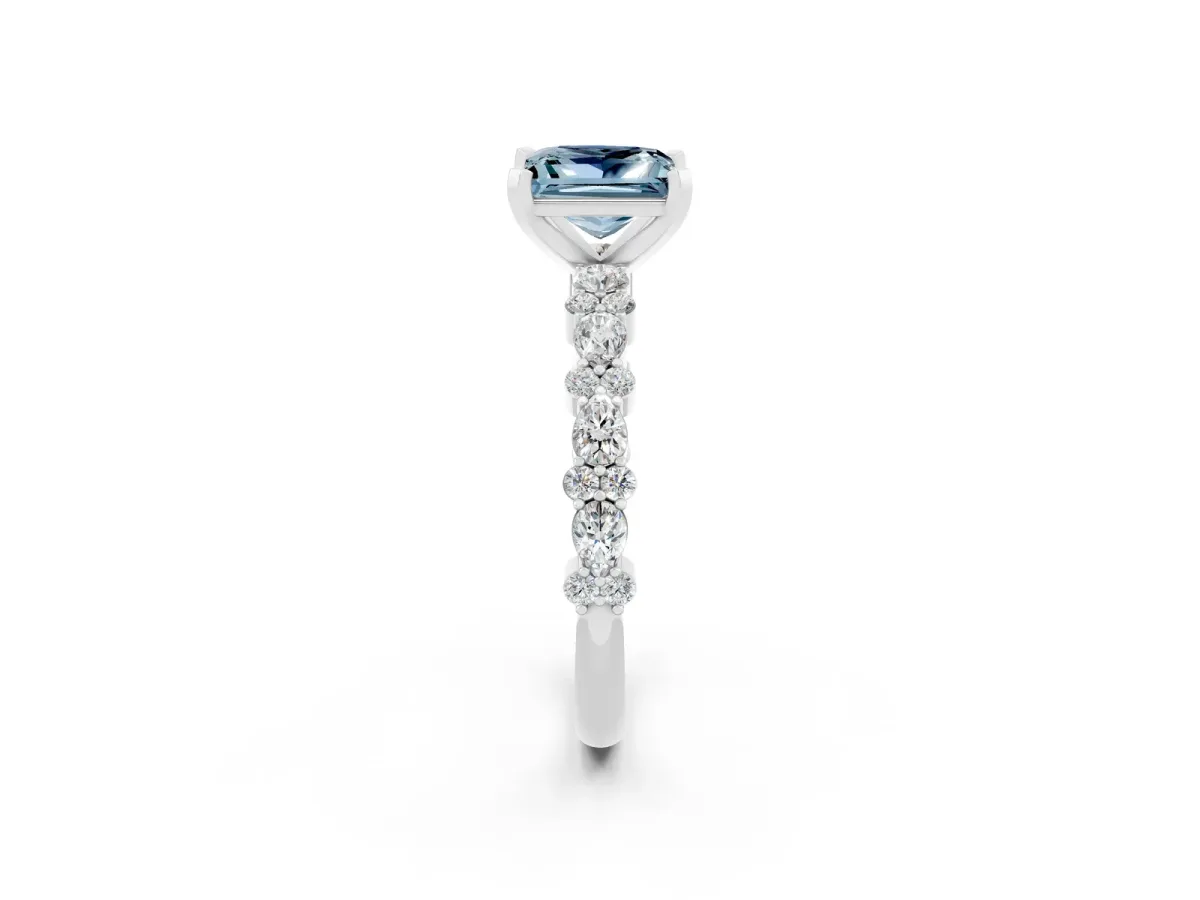 Princess Cut Aquamarine Side Stone Solitaire Ring with Round and Four-Prong Setting Silver