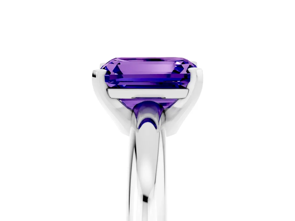 Emerald Cut Tanzanite Solitaire Engagement Ring with Round Band and Four-Prong Setting Silver
