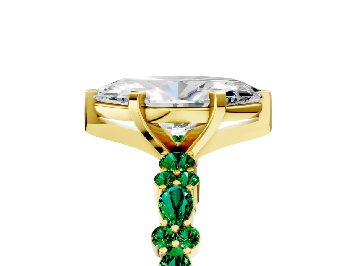 Marquise Cut Diamond Side Stone Solitaire Ring with Round Emerald and Four-Prong Setting Yellow gold