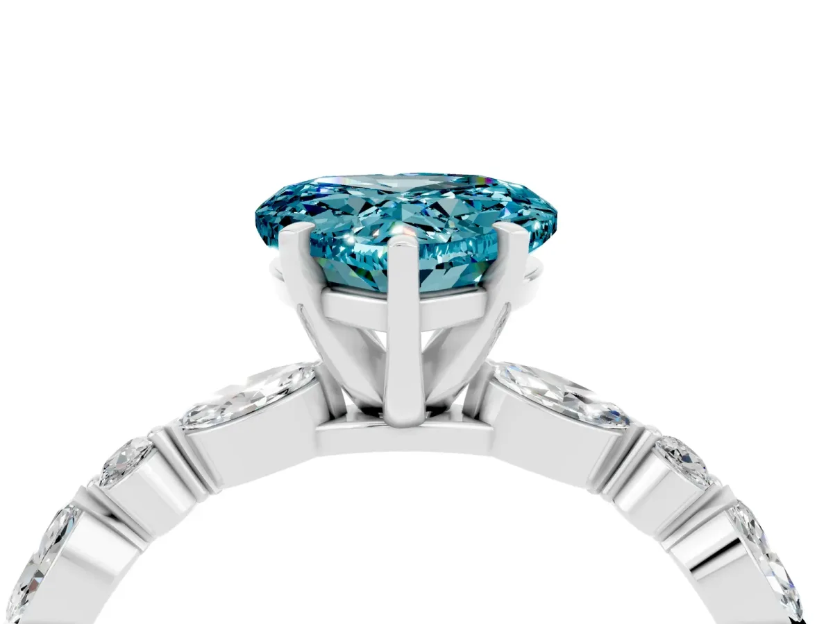 Heart Cut Blue Topaz Ring with Marquise and Round Side Stones and Four-Prong Setting Silver