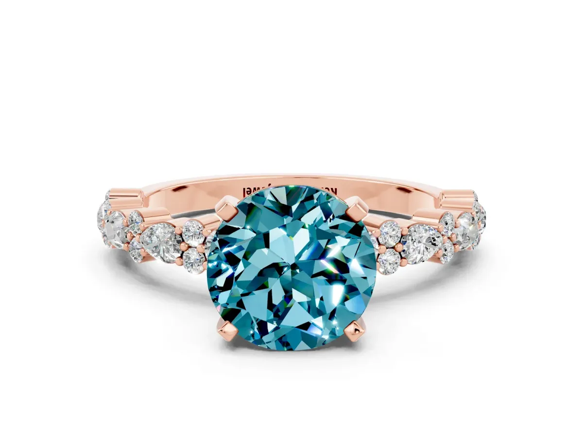 Round Cut Blue Topaz Side Stone Solitaire Ring with Round and Four-Prong Setting Rose gold