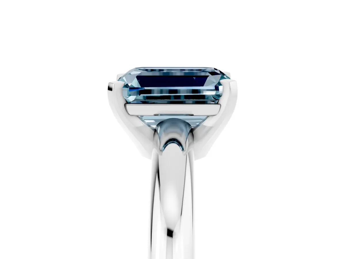 Emerald Cut Aquamarine Solitaire Engagement Ring with Round Band and Four-Prong Setting Platinum