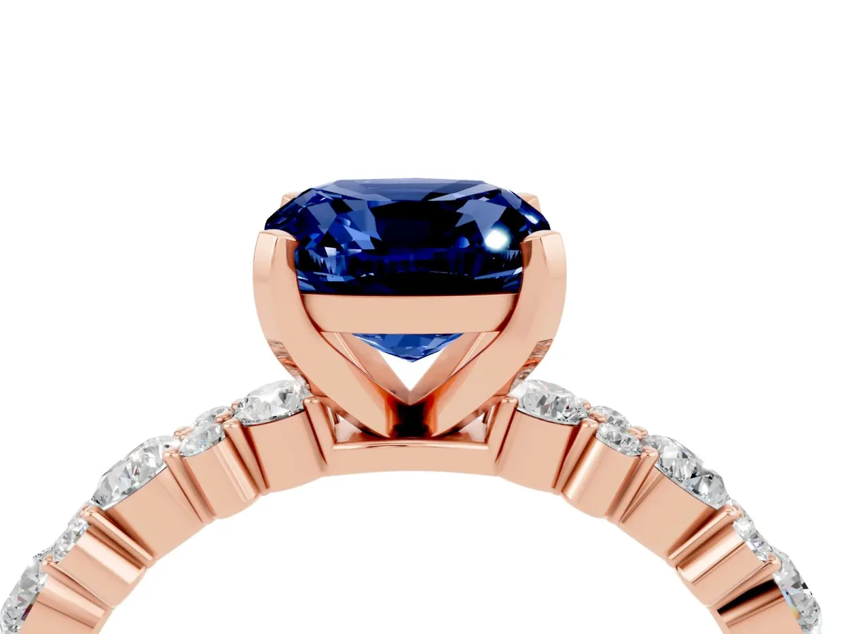 Cushion Cut Blue Sapphire Side Stone Solitaire Ring with Round and Four-Prong Setting Rose gold