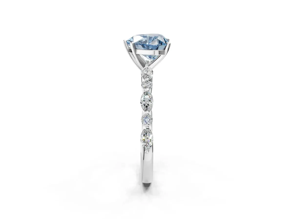 Fancy Blue Heart Cut Diamond Ring with Marquise and Round Side Stones and Four-Prong Setting Silver