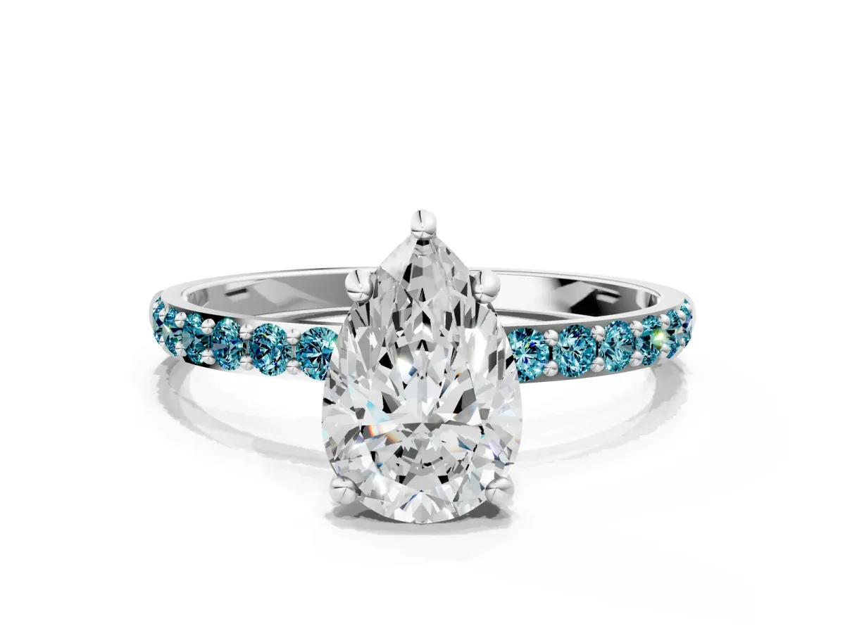 Pear Cut Diamond Solitaire Ring with Round Blue Topaz Pavé Band and Prong Setting Platinum