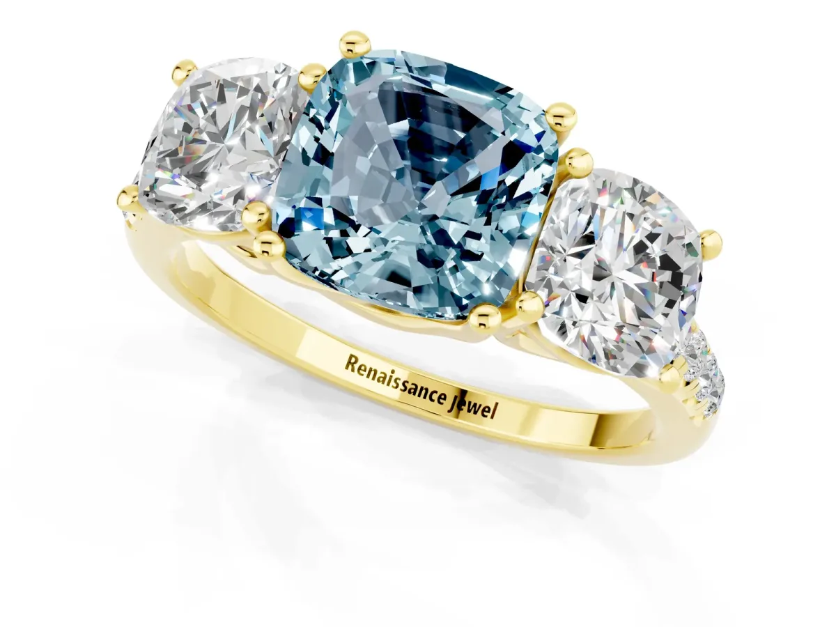 Three-Stone Cushion Cut Aquamarine Ring with Round Pavé Band and Prong Setting Yellow gold