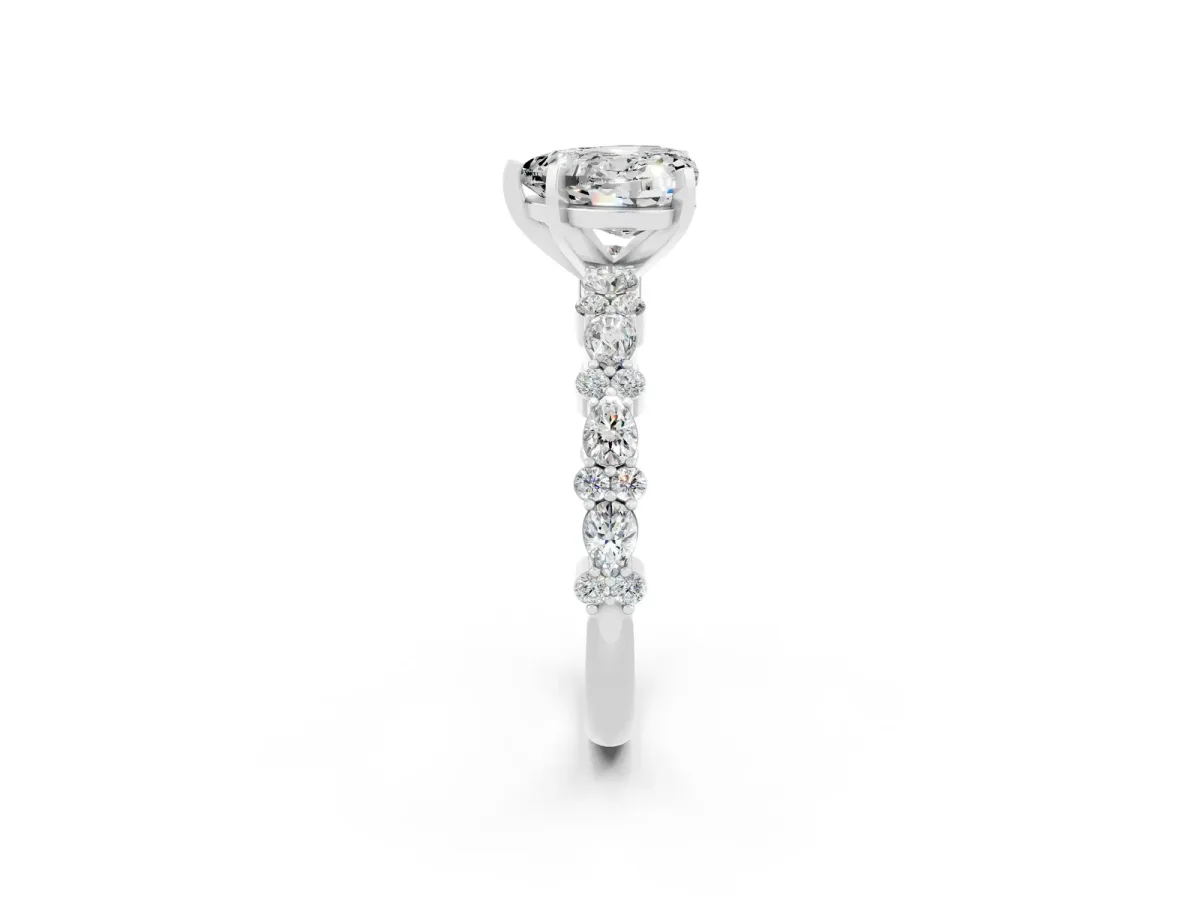 Heart Cut Moissanite Side Stone Solitaire Ring with Round and Four-Prong Setting Silver