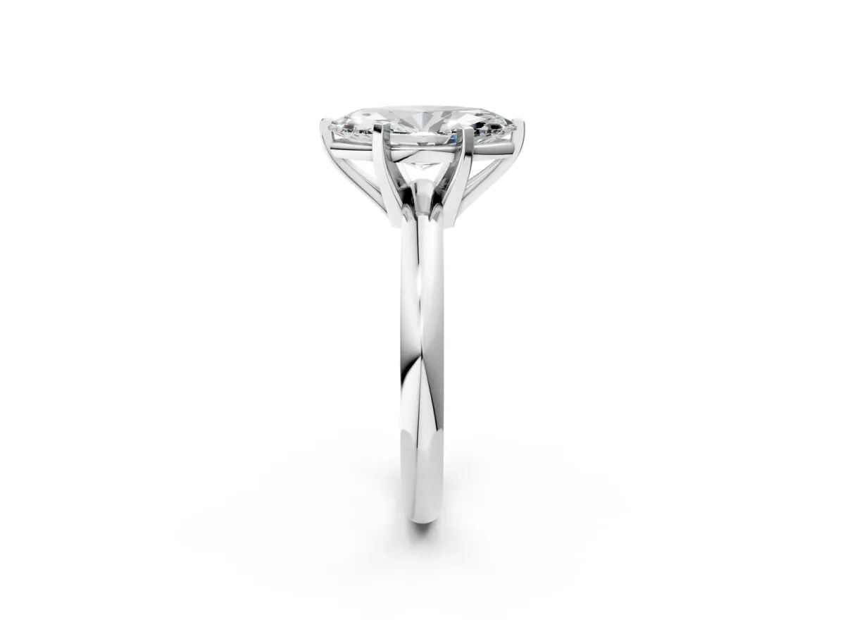 Marquise Cut Diamond Solitaire Engagement Ring with Round Band and Four-Prong Setting Platinum
