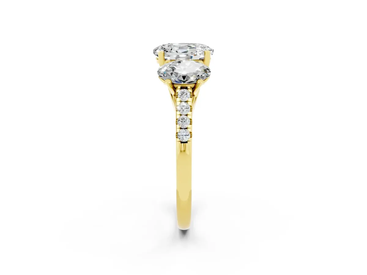 Three-Stone Oval Cut Moissanite Ring with Round Pavé Band and Prong Setting Yellow gold