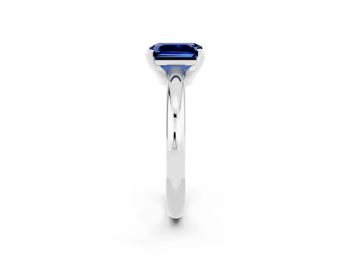 Emerald Cut Blue Sapphire Solitaire Engagement Ring with Round Band and Four-Prong Setting Platinum
