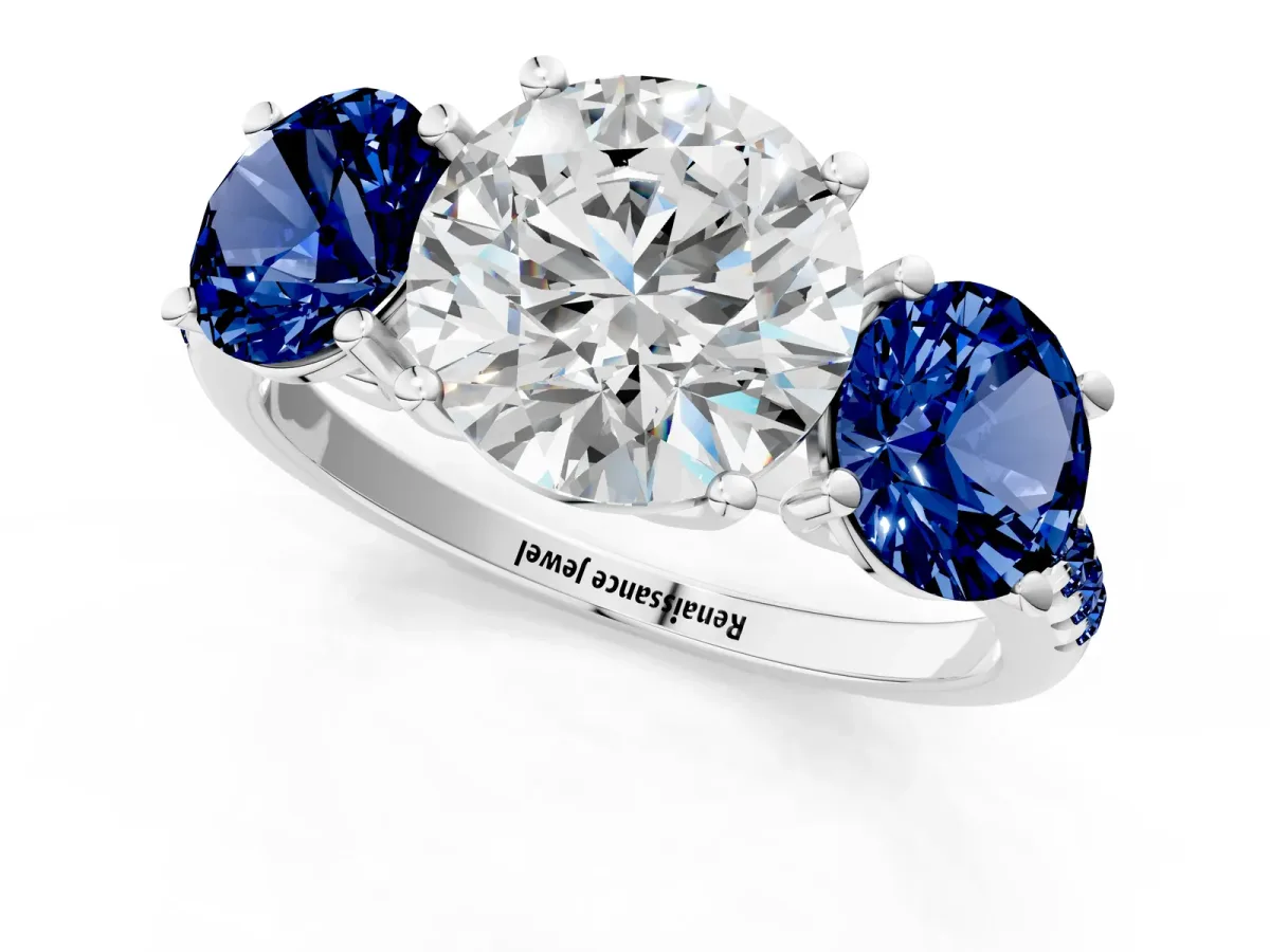 Three-Stone Round Cut Diamond Ring with Round Blue Sapphire Pavé Band and Prong Setting White gold