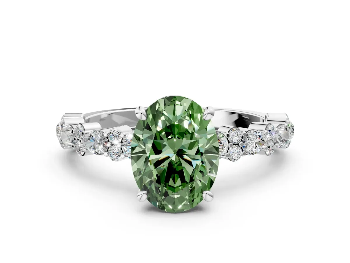 Fancy Green Oval Cut Diamond Side Stone Solitaire Ring with Round and Four-Prong Setting Platinum