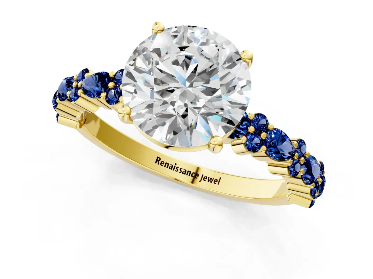 Round Cut Diamond Side Stone Solitaire Ring with Round Blue Sapphire and Four-Prong Setting Yellow gold