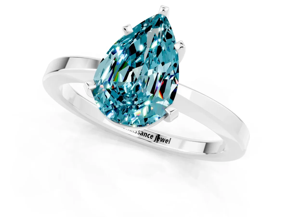 Pear Cut Blue Topaz Solitaire Engagement Ring with Classic Band and Four-Prong Setting Silver