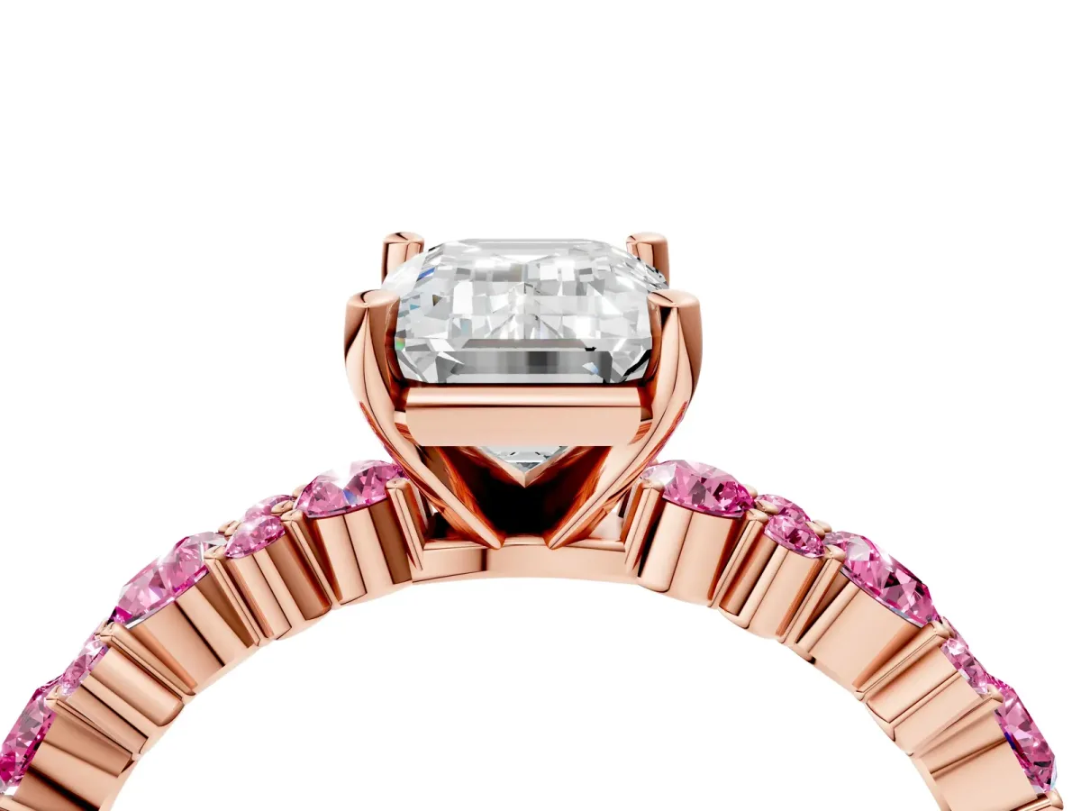 Emerald Cut Diamond Side Stone Solitaire Ring with Round Pink Sapphire and Four-Prong Setting Rose gold
