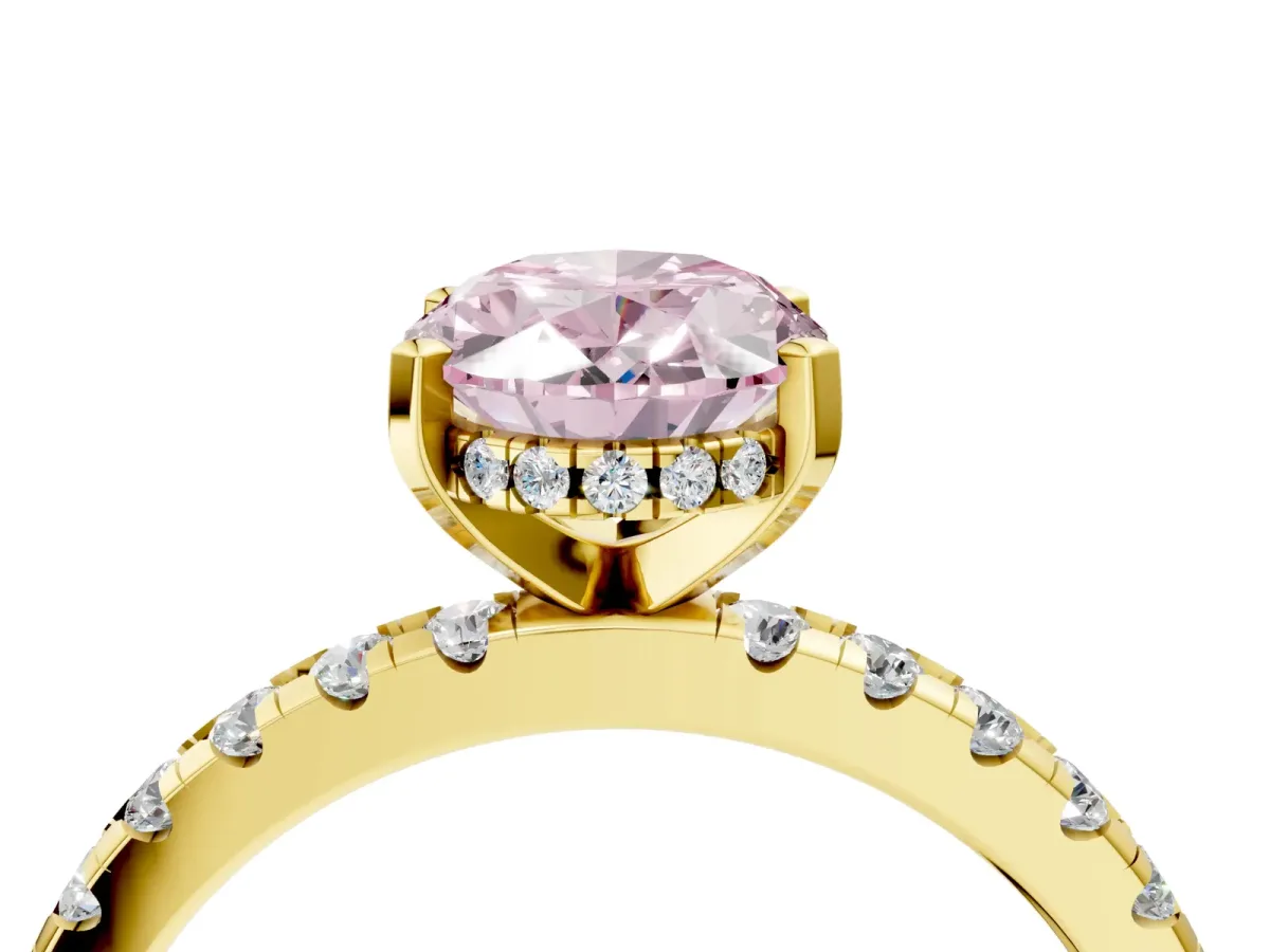 Fancy Pink Oval Cut Diamond Solitaire Ring with Round Pavé Band and Four-Prong Setting Yellow gold