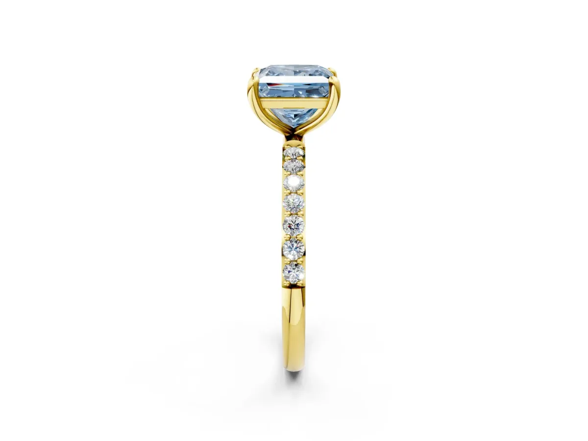 Fancy Blue Princess Cut Diamond Solitaire Ring with Round Pavé Band and Prong Setting Yellow gold