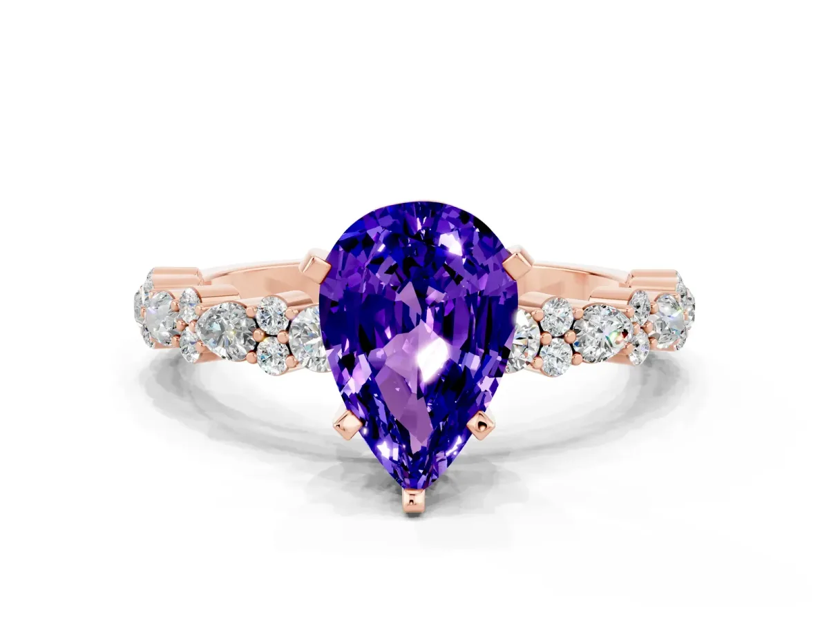 Pear Cut Tanzanite Side Stone Solitaire Ring with Round and Four-Prong Setting Rose gold