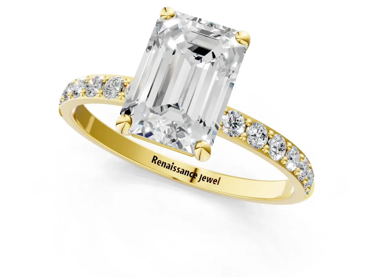 Emerald Cut Diamond Solitaire Ring with Round Pavé Band and Prong Setting Yellow gold