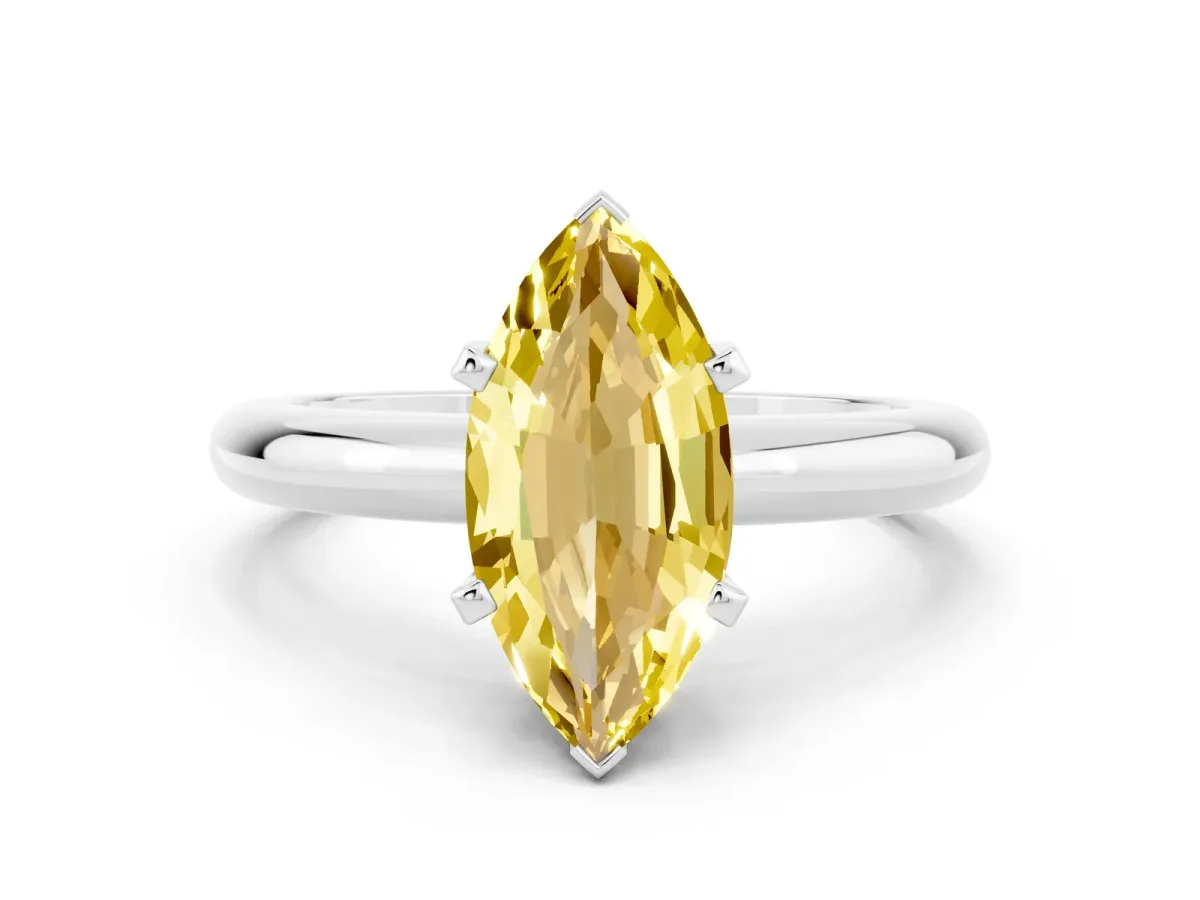 Marquise Cut Yellow Sapphire Solitaire Engagement Ring with Round Band and Four-Prong Setting Silver