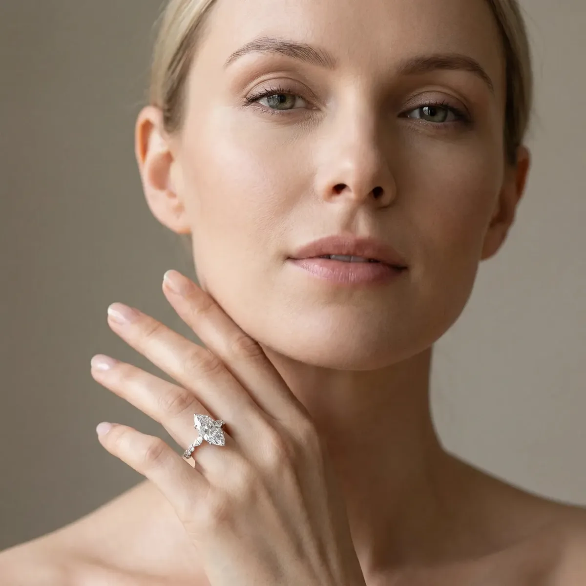 Marquise Cut Diamond Ring with Marquise and Round Side Stones and Four-Prong Setting Silver