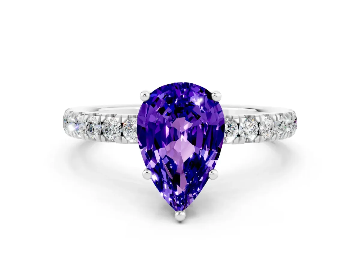 Pear Cut Tanzanite Pave Band Solitaire Ring with Round and Prong Setting Platinum