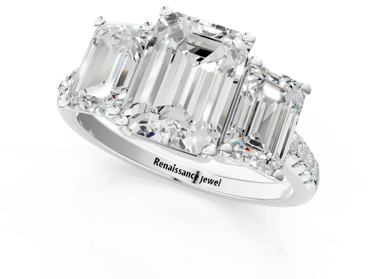 Three-Stone Emerald Cut Diamond Ring with Round Moissanite Pavé Band and Prong Setting White gold