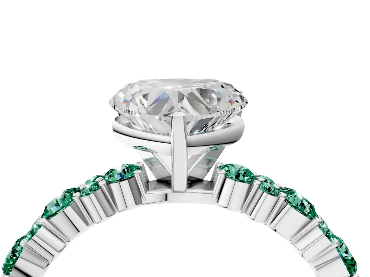 Heart Cut Diamond Side Stone Solitaire Ring with Round Green Sapphire and Four-Prong Setting Platinum