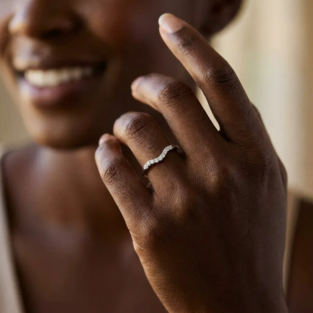 Curved Diamond Wedding Band with Round Cut Stones and Shared Prong Setting White gold