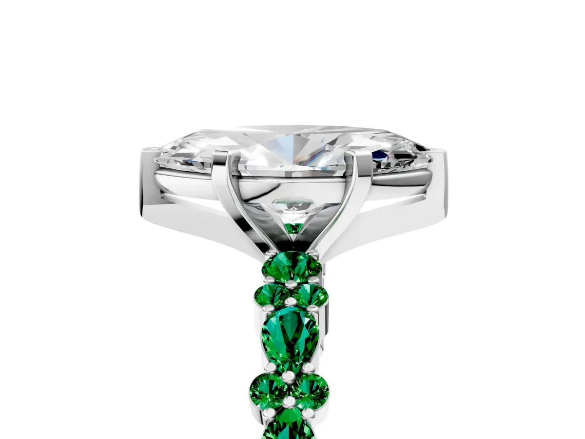 Marquise Cut Diamond Side Stone Solitaire Ring with Round Emerald and Four-Prong Setting Platinum