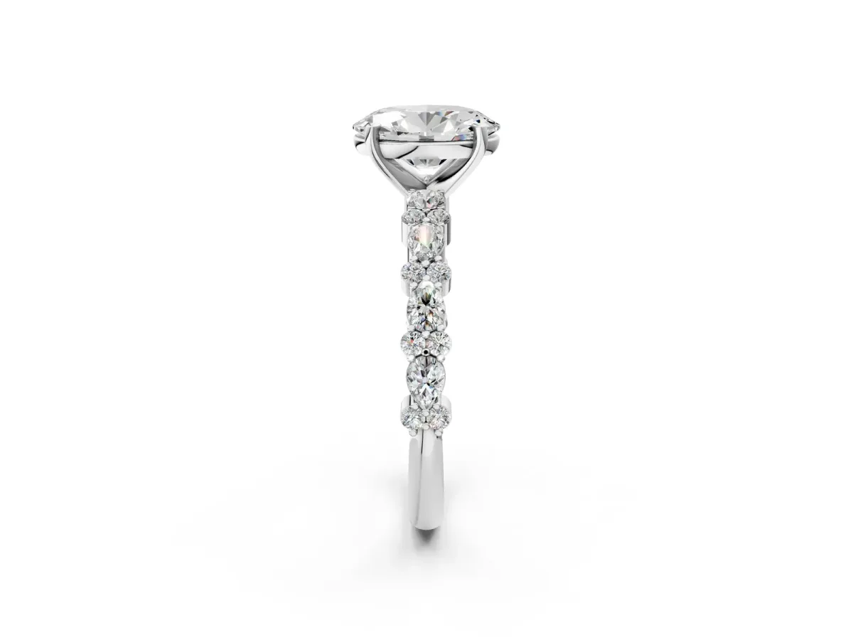 Oval Cut Diamond Side Stone Solitaire Ring with Round and Four-Prong Setting Platinum