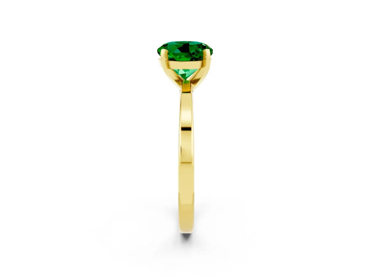 Round Cut Emerald Solitaire Engagement Ring with Classic Band and Four-Prong Setting Yellow gold