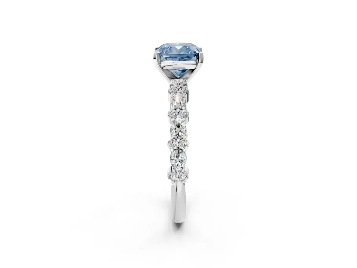 Fancy Blue Cushion Cut Diamond Side Stone Solitaire Ring with Round and Four-Prong Setting Platinum